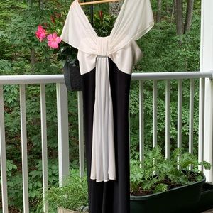 Black, size 16 dress with cream scarf, diamonds.